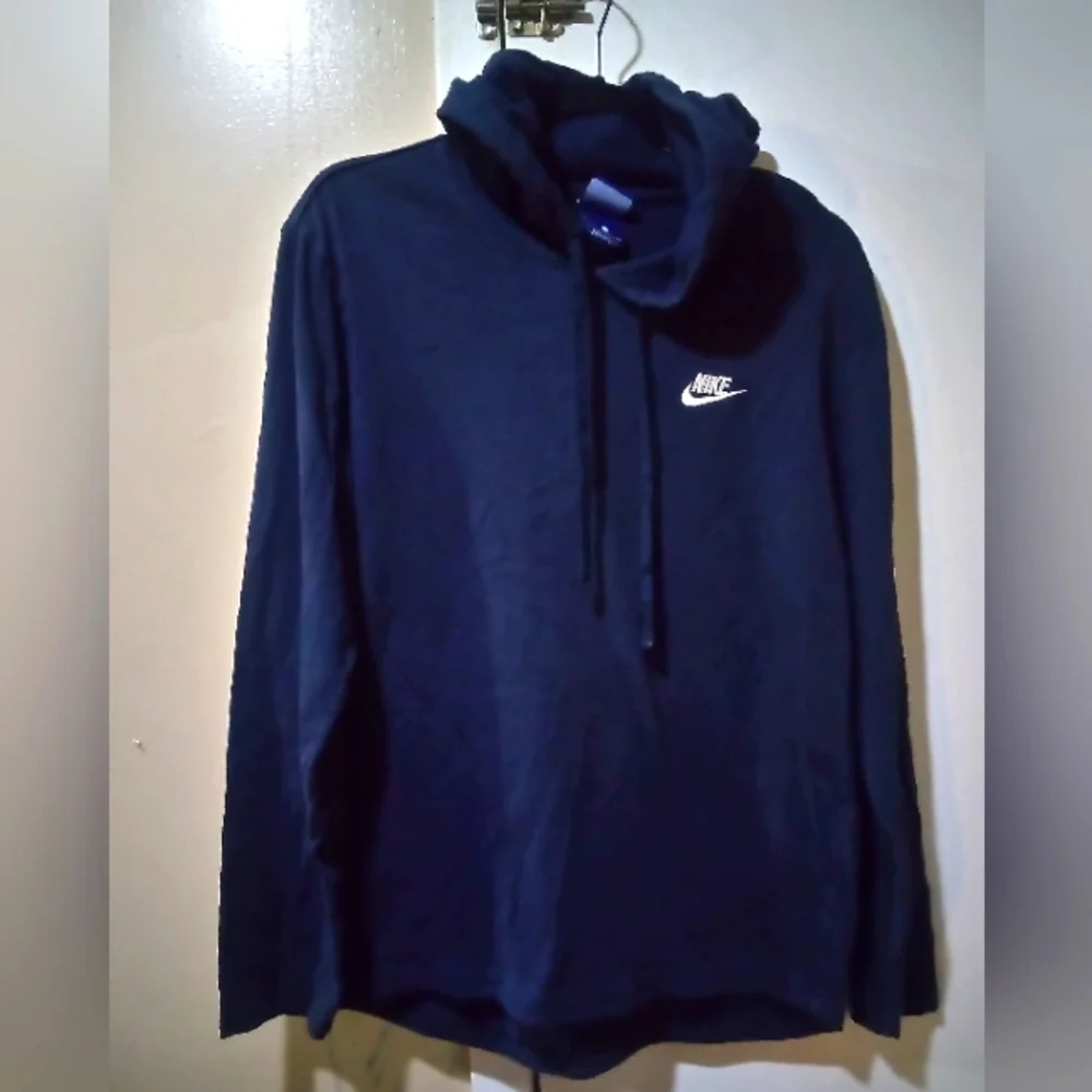 Men's Nike long sleeve shirt with hood. Dark blue with white logo, size small
